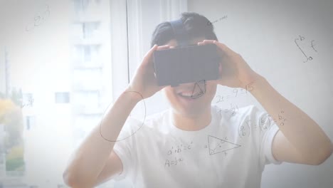 animation of mathematical drawings and equations over man wearing vr headset