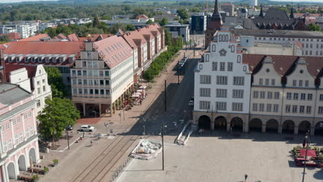 Forwards-tracking-shot-of-tram-driving-around-Steintor-town-gate.-Public-transportation-in-city