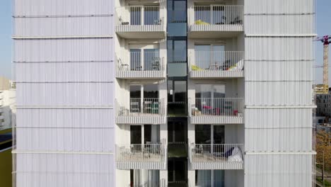 modern architectural brilliance of building with its facade of aluminum chains