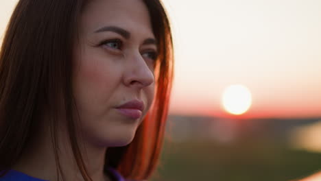 sorrowful woman facial expression at sunset closeup attractive lady suffers from loneliness at