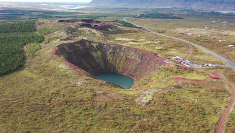 aerial 4k video of large volcanic crater lake in iceland