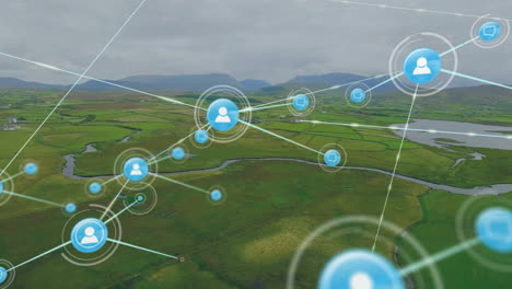 animation of network of connections with icons over landscape