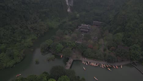 aerial-view-of-ancient-temples-along-the-river-in-the-mountainous-region-of-Ninh-Ninh-in-Northern-Vietnam