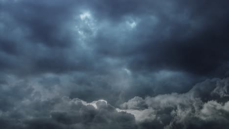 clouds-gradually-brightening-in-a-dark-sky-with-occasional-lightning-strikes