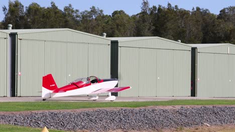 sequence of a small plane taking off into the sky