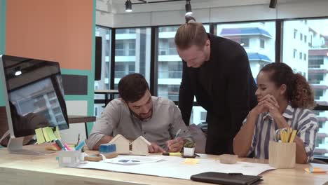 creative business people group having conversation at office desk in workplace.