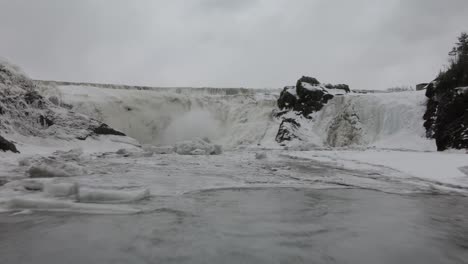 Icy-River-With-Waterfalls-During-Winter-At-Chaudiere-Falls-Park-In-Levis,-Quebec-City,-Canada