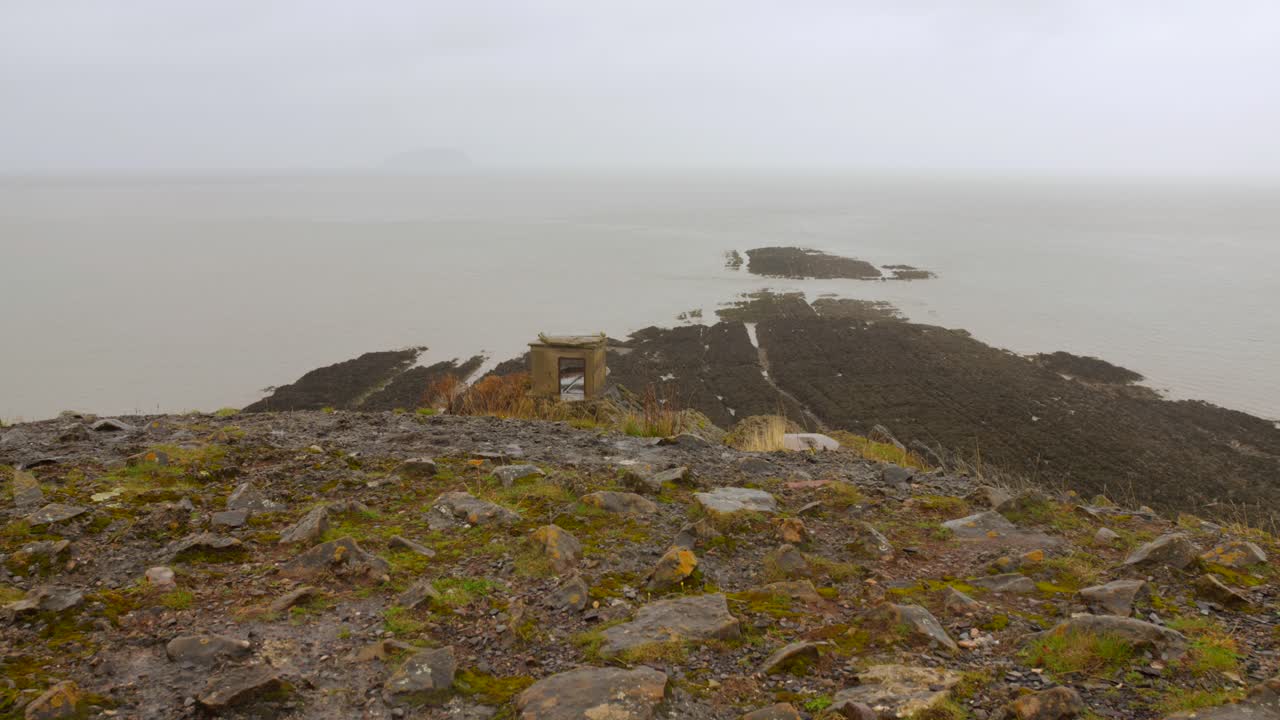 A breathtaking view from Brean Down showcases a serene coastal landscape with the sea stretching into the distance.