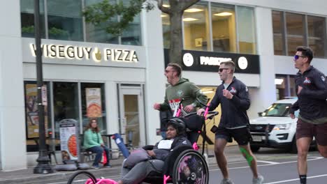 wheelchair marathon race in city streets