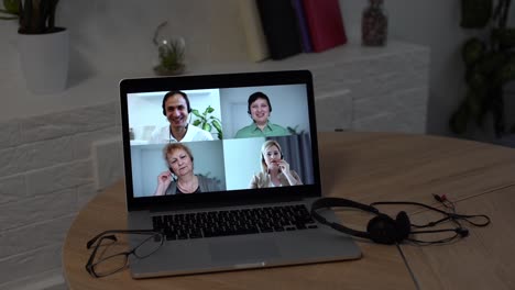 video conferencing technology in kitchen for video call with colleagues at home and in offices