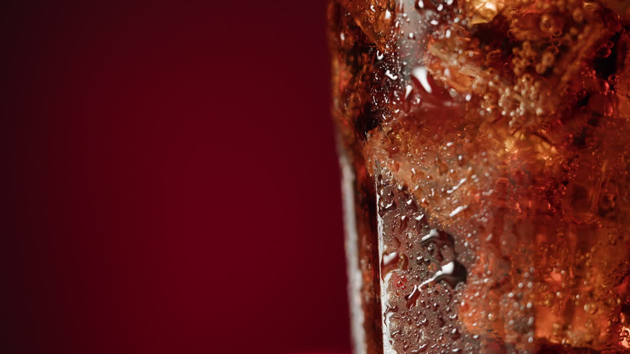 Close-up of a glass of soda with ice