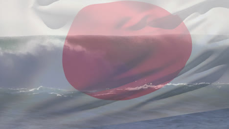 Digital composition of japan flag waving against aerial view of waves in the sea