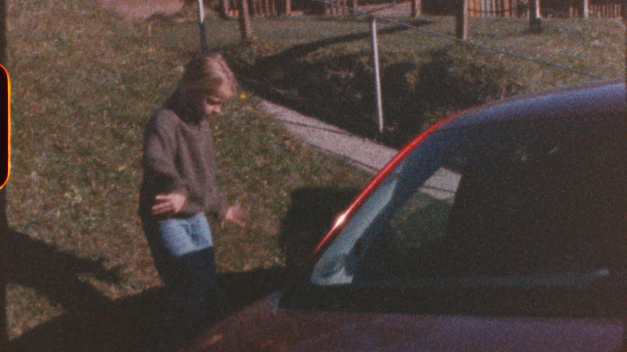 Child Playing Outdoors in Yard