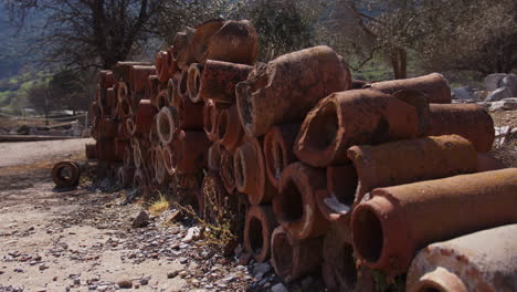 wide shot of a stack of ancient drainage pipes in ephesus