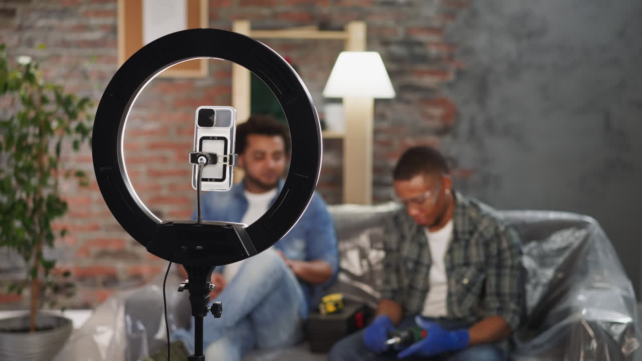 African-American constructors record video about repairing