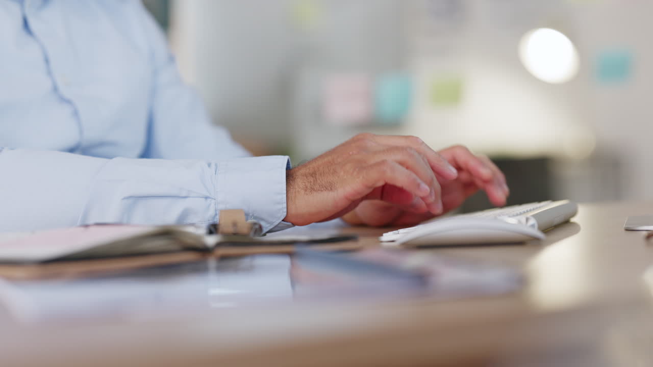 Man suffering with aching wrist pain while working