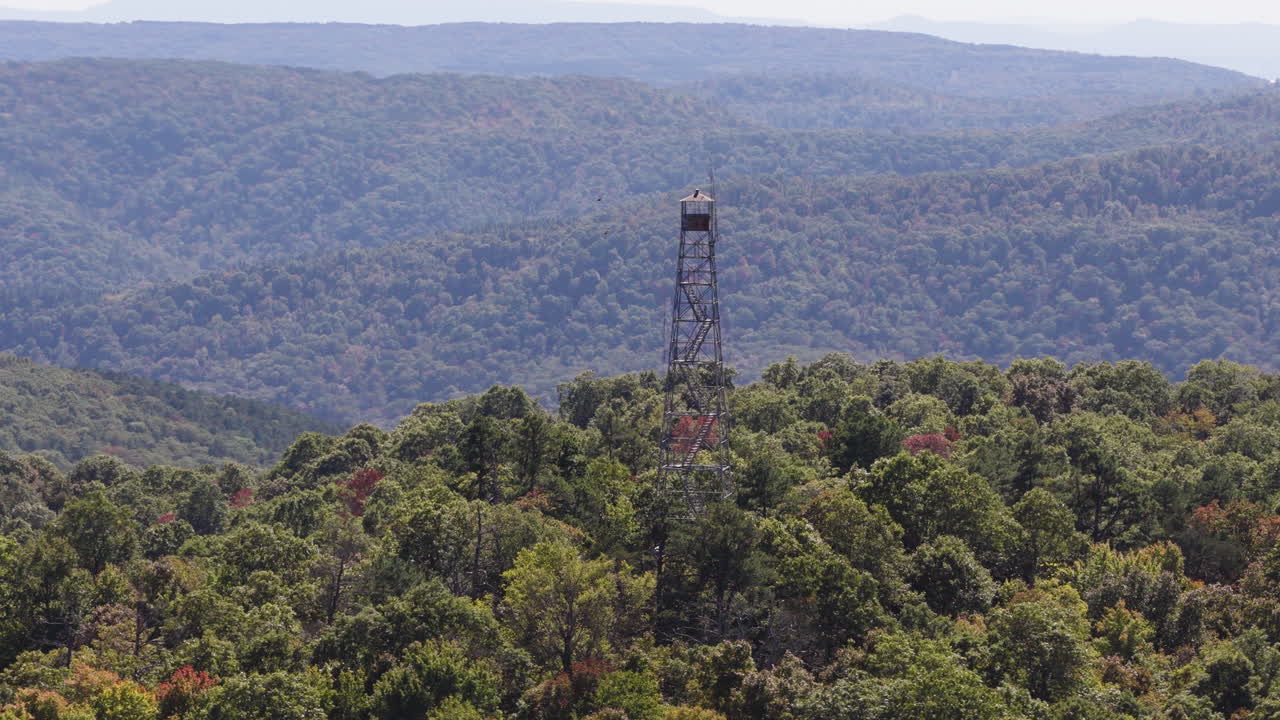 Lush Green Forest And Devil's Knob Fire Tower In Arkansas, USA - Drone Shot