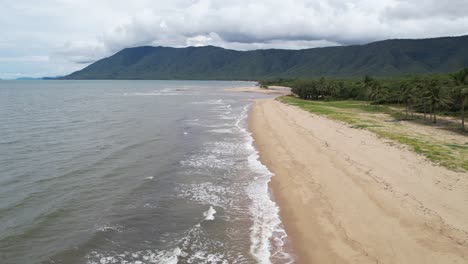 Aerial-View-of-Empty-Wild-Sandy-Beach-on-Coastline-of-Queensland,-Australia