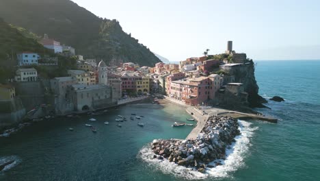 Aerial-Pullback-Reveals-Charming-Port-of-Vernazza,-Cinque-Terre-Italy
