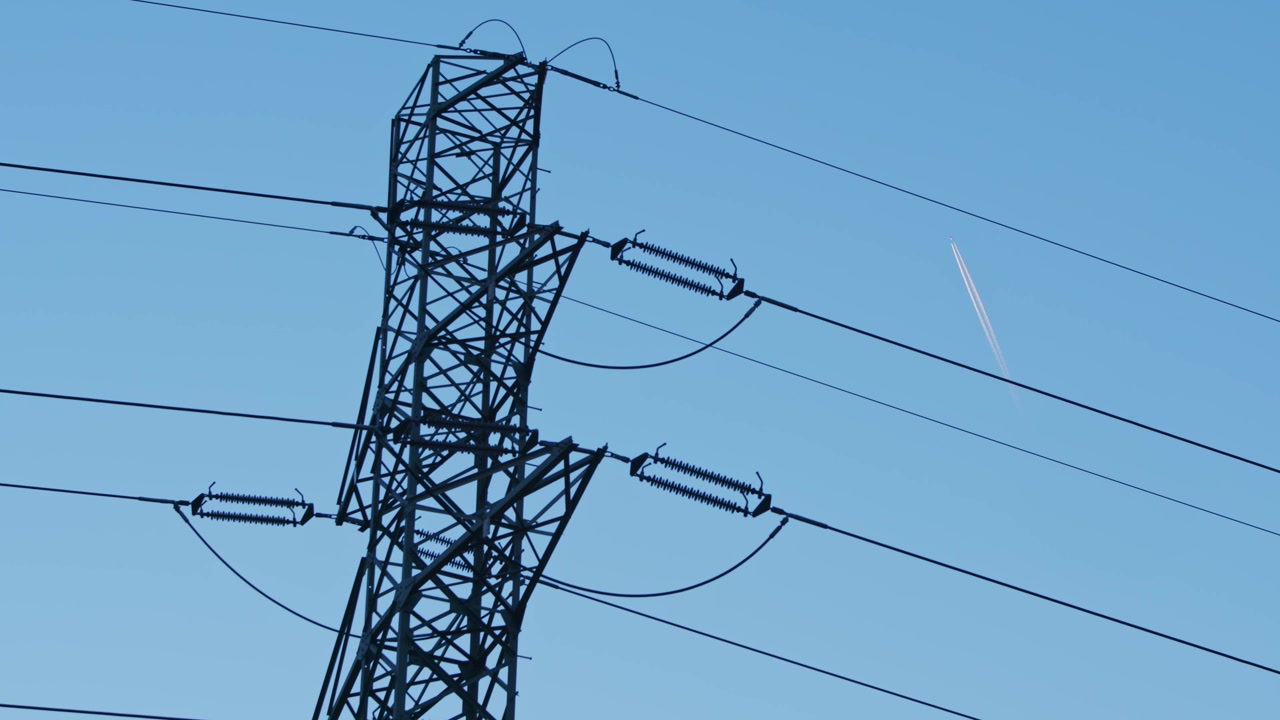 Electricity pylon with power lines, close up detail
