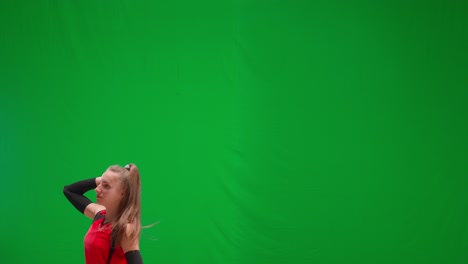 woman playing volleyball on green screen