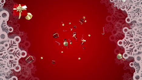 snowflakes against christmas candy cane, bauble and gift icons falling against red background