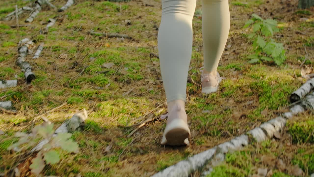 Person Walking Through Forest