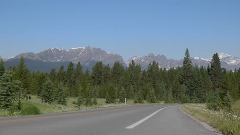 Canada-road-trip-destination-empty-road,-Banff-National-park-Rocky-Mountain-peak