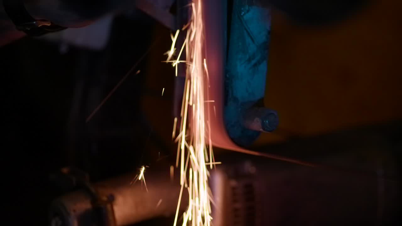 Flying a lot of sparks. Close-up