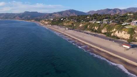 Tracking-shot-of-beaches-along-the-coast-of-Malibu,-California