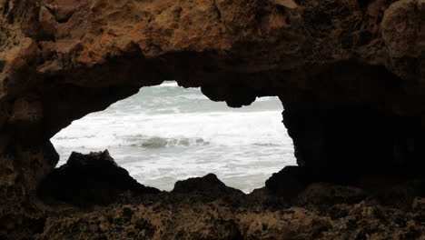 an australian coastal beach with limestone cliffs and formations