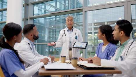 discussion, tablet and team of doctors in meeting