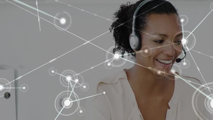 Animazione di reti di connessioni su una donna d'affari che usa auricolari telefonici