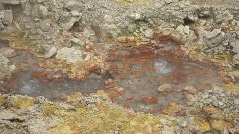 boiling hot geothermal volcanic spring water at the geysers "caldeiras" of furnas, san miguel island, azores