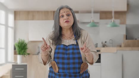 indian aged housewife talking to the camera