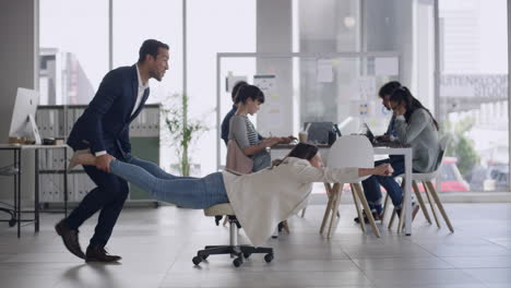 two colleagues playing and having fun