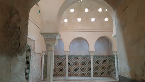 comares bath or central room of bath in alhambra, granada. tilt down