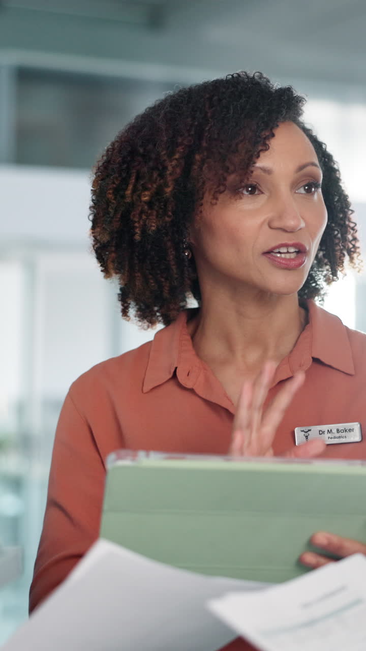 Doctor reviewing patient paperwork