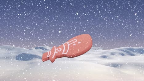 animación de la navidad hombre de nieve galleta de pan de jengibre sobre la nieve que cae en el paisaje de invierno.