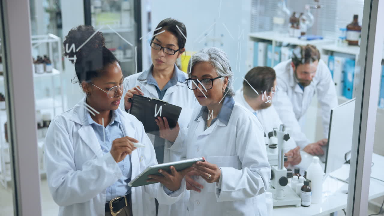 Diverse Scientists Collaborating and Writing Chemical Formulas on Glass Board