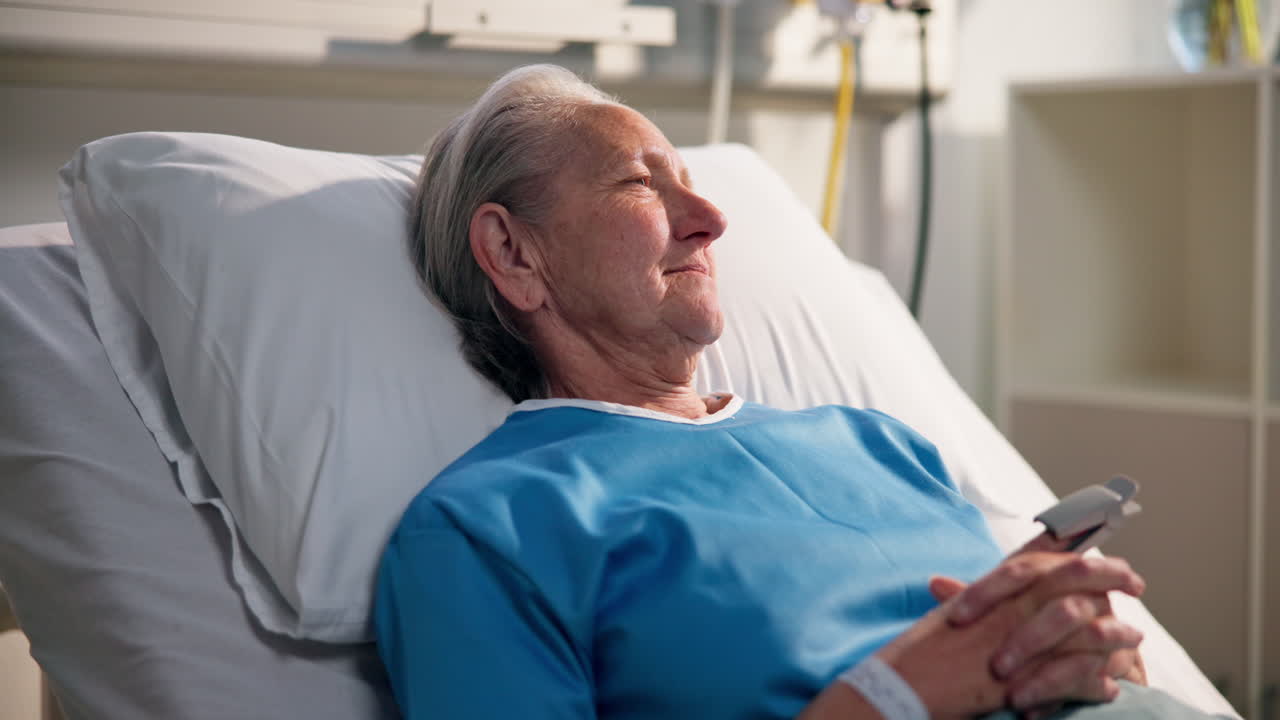 Elderly Woman Recovering in Hospital Bed