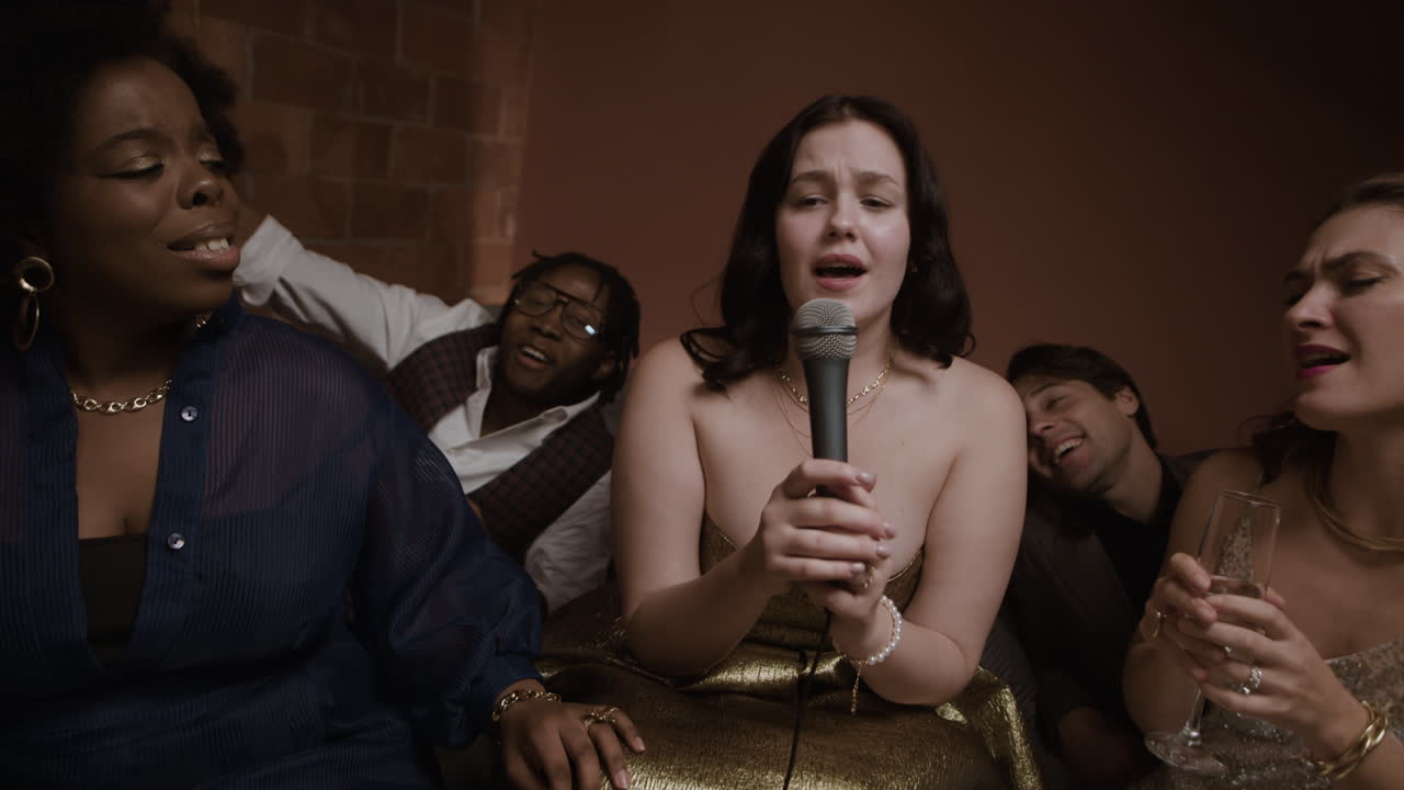 Friends Enjoying Karaoke at a Party