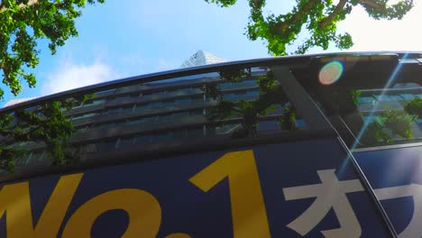 bus running on skyscraper background in tokyo