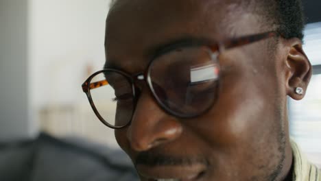 close-up portrait of a man wearing glasses