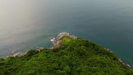 phuket island’s stone coast, green forests, and blue waters: a breathtaking 4k drone flight over tropical paradise