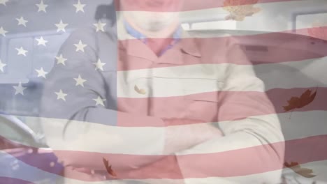 animación de la bandera de américa agitando y cayendo hojas más de cerca mecánico caucásico con herramienta