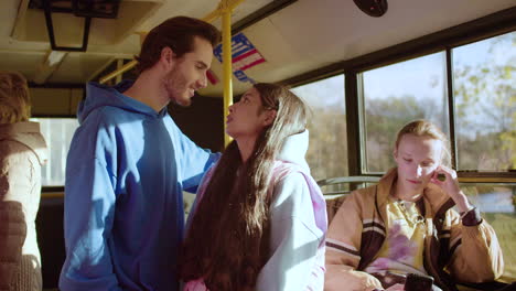 couple talking in a bus