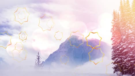 animación de estrellas de navidad cayendo sobre el paisaje de la montaña