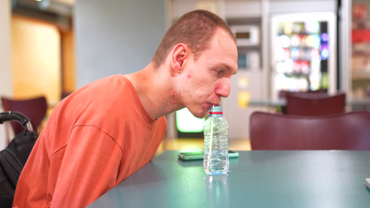 Man Drinking Water from a Bottle