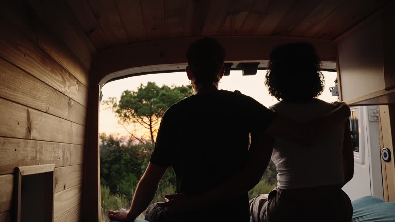 Couple Enjoying Sunset in Van